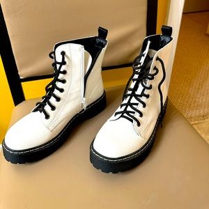 White and black boots